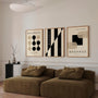 black and beige geometric bauhaus poster set in contemporary office workspace