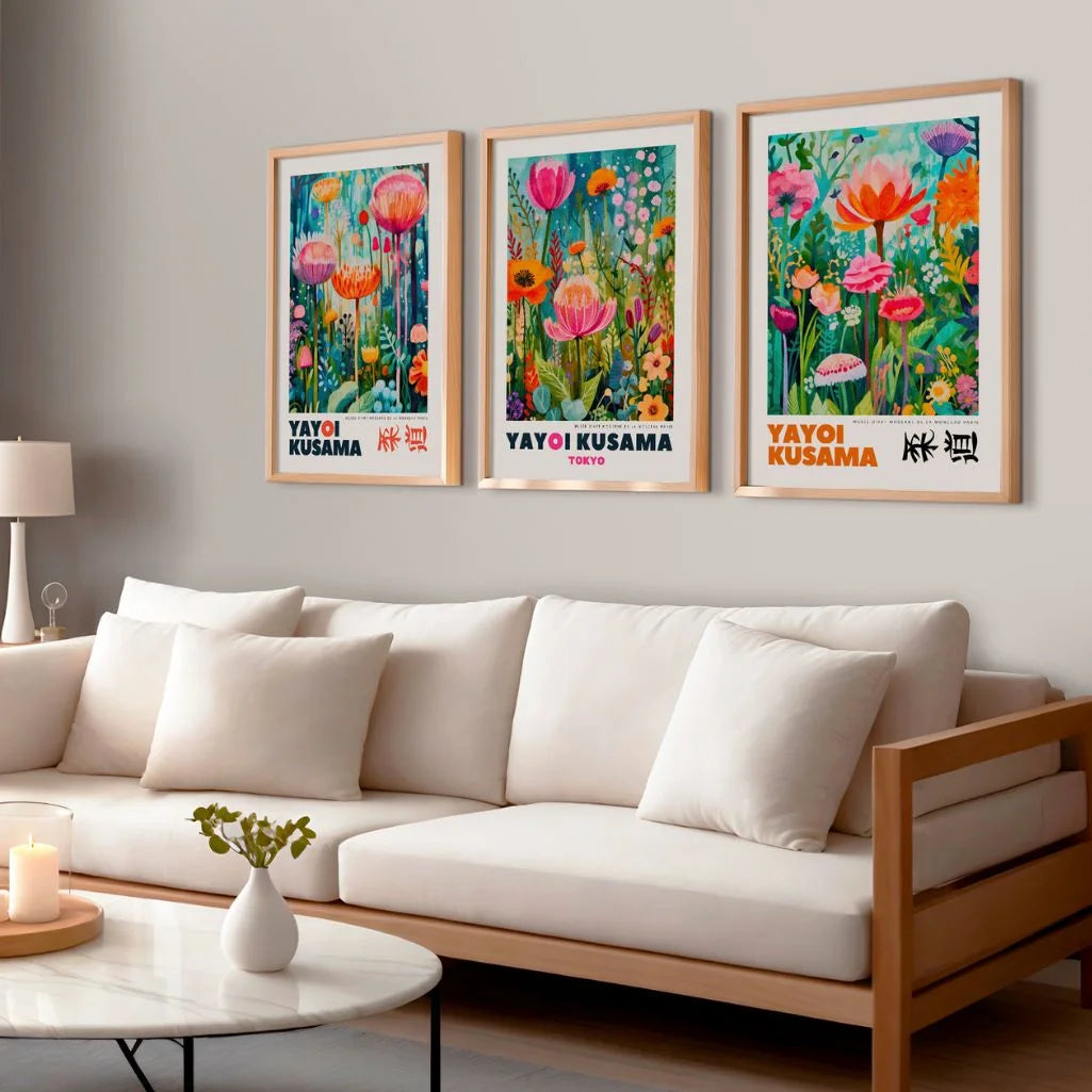 Pink, orange and turquoise floral poster set of 3 in living room, bright botanical wall decor above sofa
