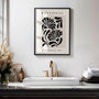 Close up of graphic botanical poster showing bold abstract flower shapes