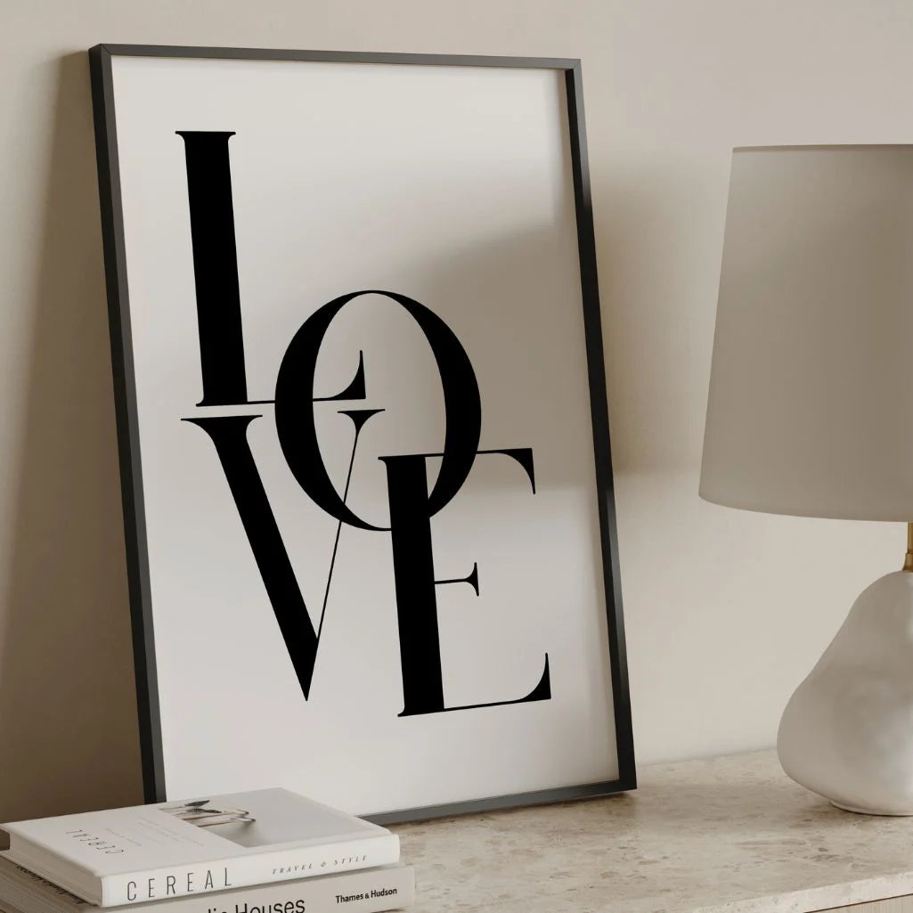 LOVE poster displayed in a soft romantic gallery wall arrangement
