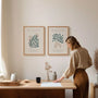 Close up of botanical poster set showing beige and green organic shapes and soft tones